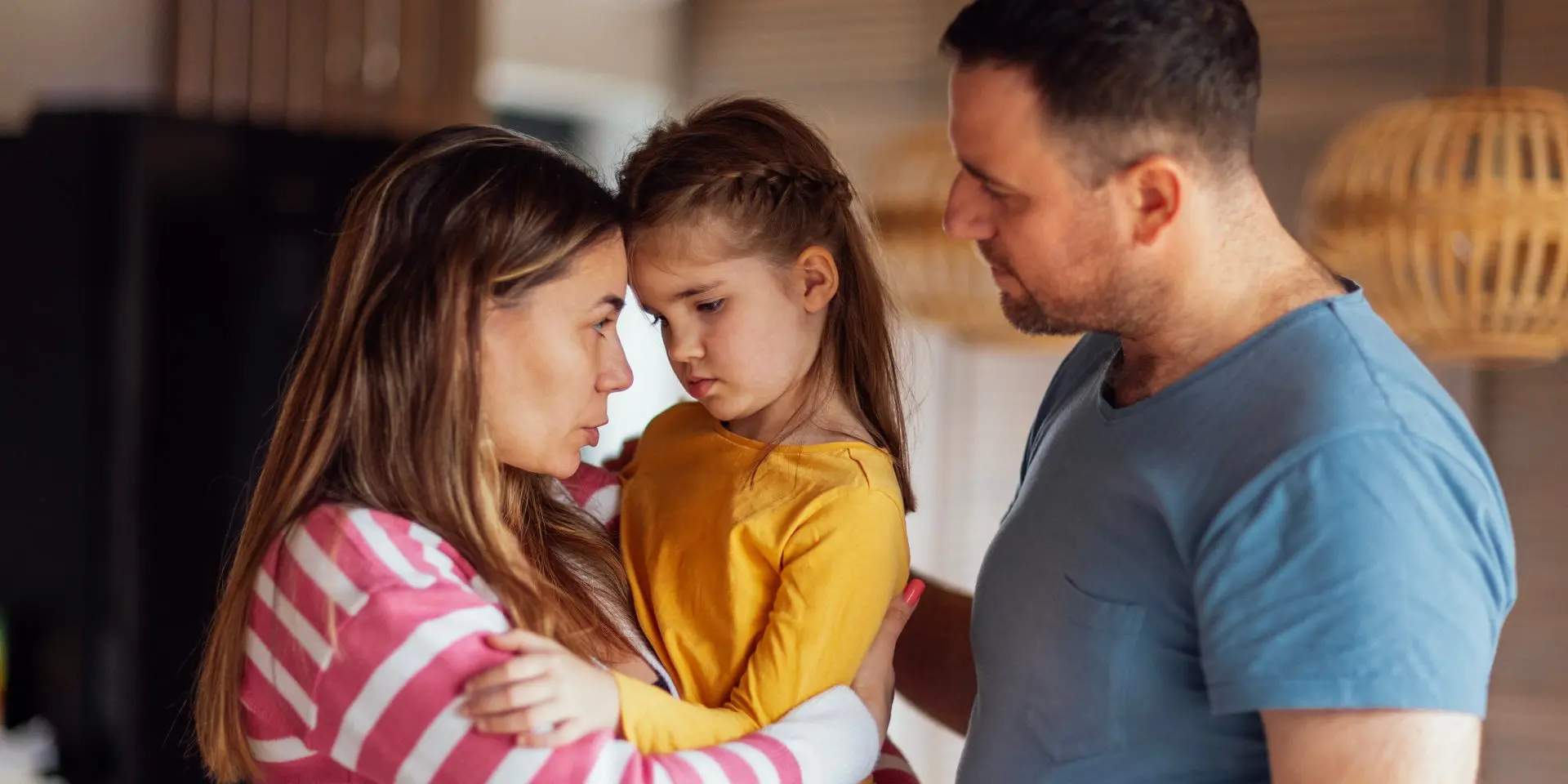 Parents talking to child.