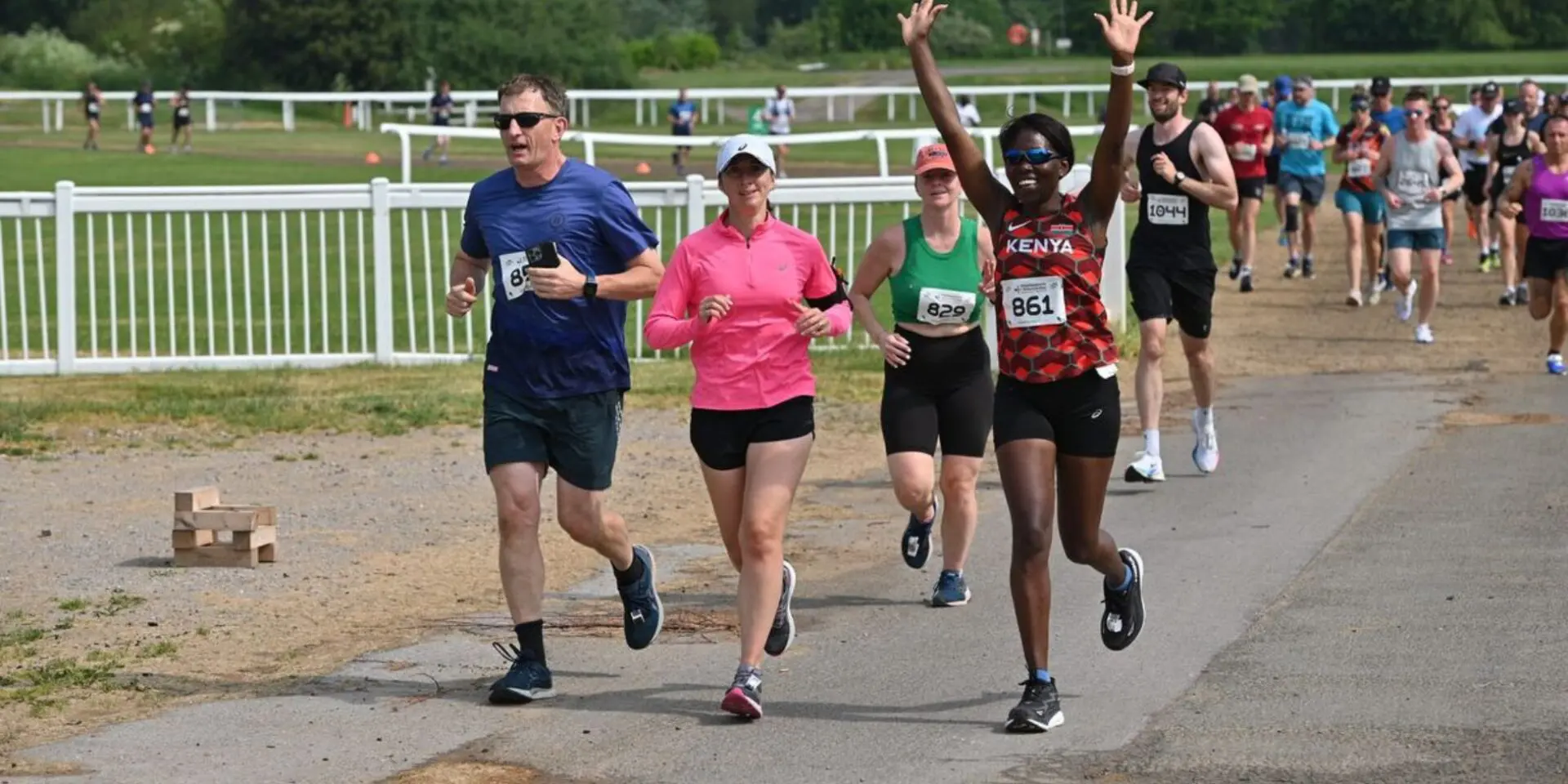 Runners cheering during the Cheltenham Running Festival