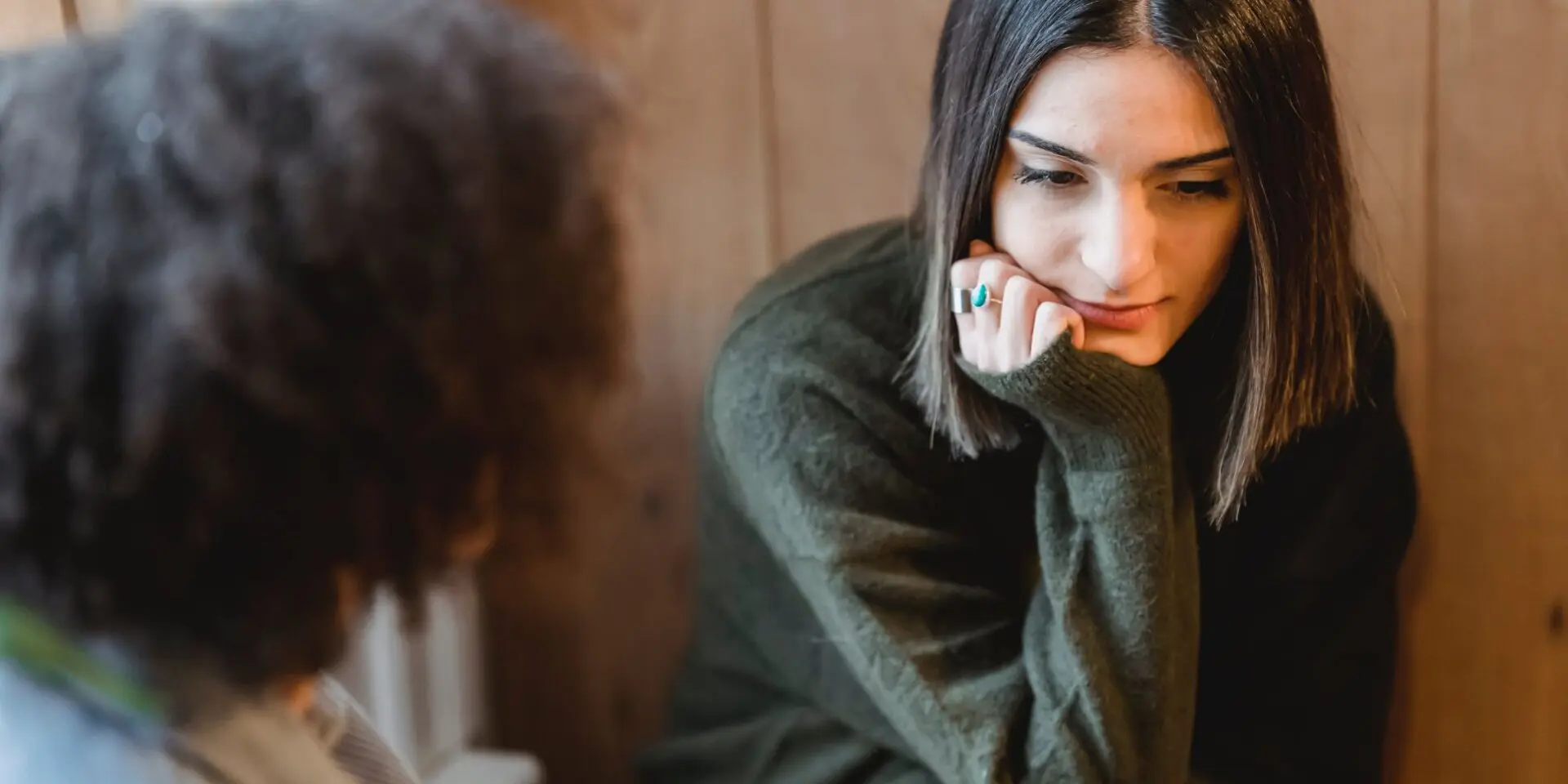 Teenage girl thinking in the middle of a conversation