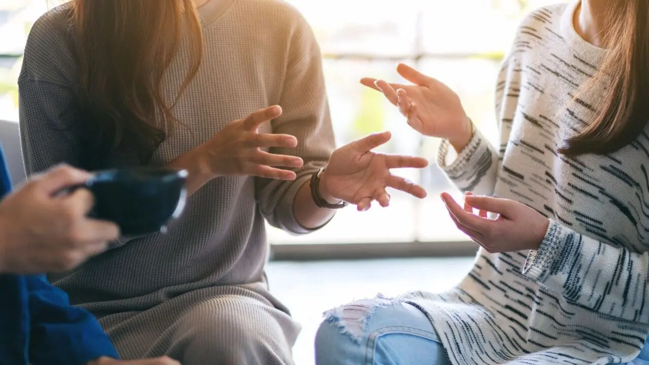 Two young girls talking