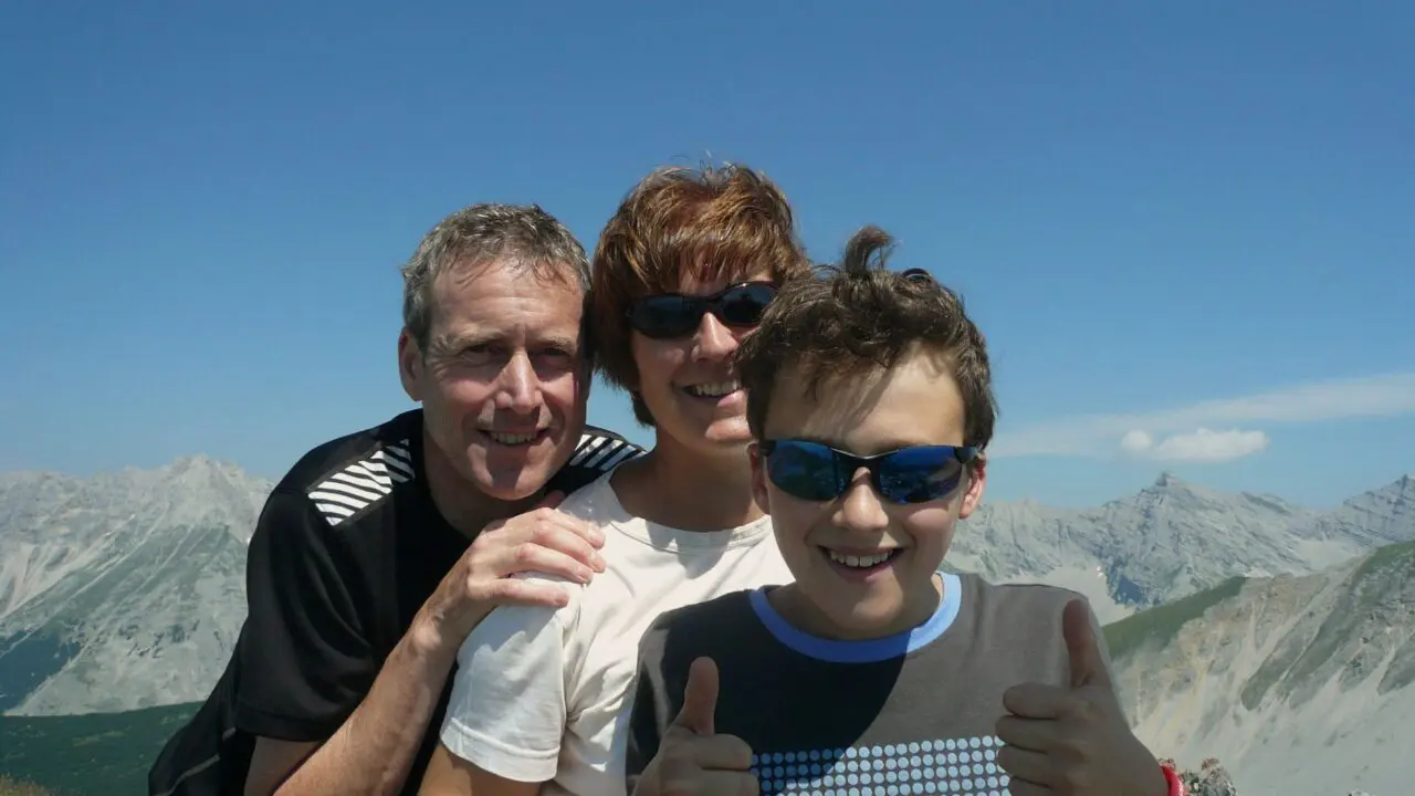 Nick with his wife and son