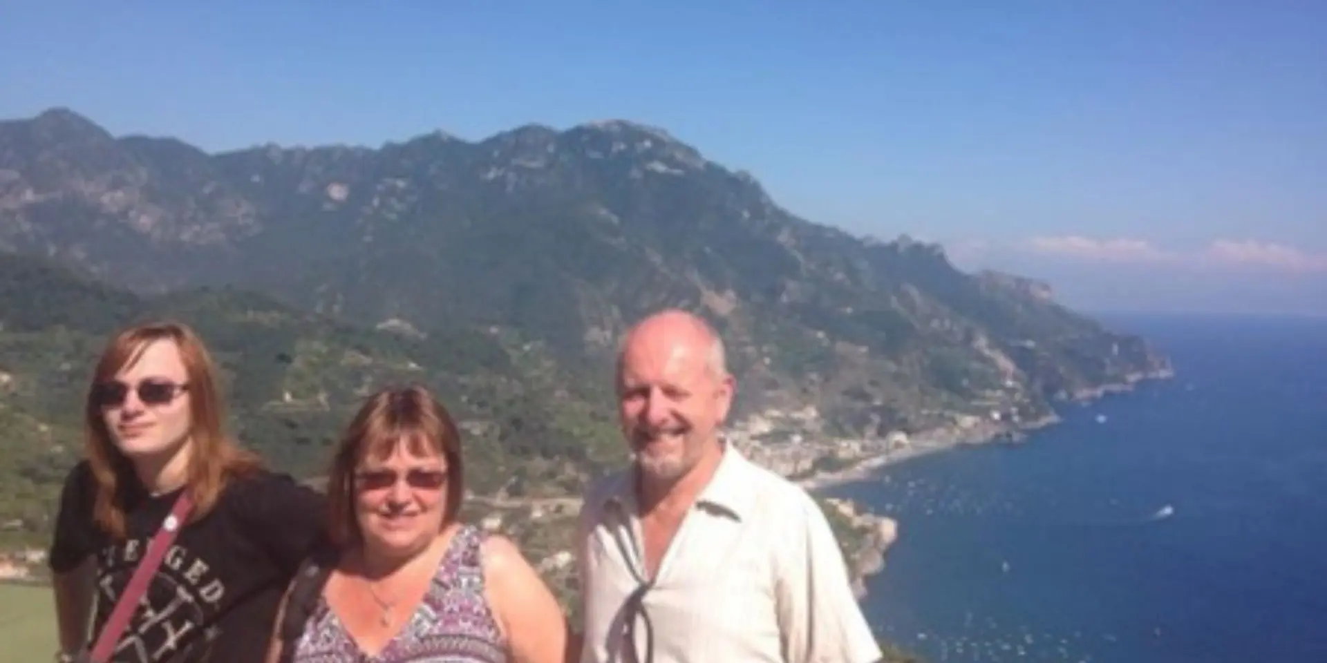 Winston's Wish lottery player, Mandy (centre) with her daughter Sasha and now husband Les