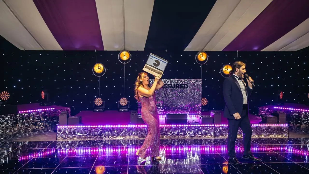 Corporate Supporters, Reassured's summer party event on a purple dance floor