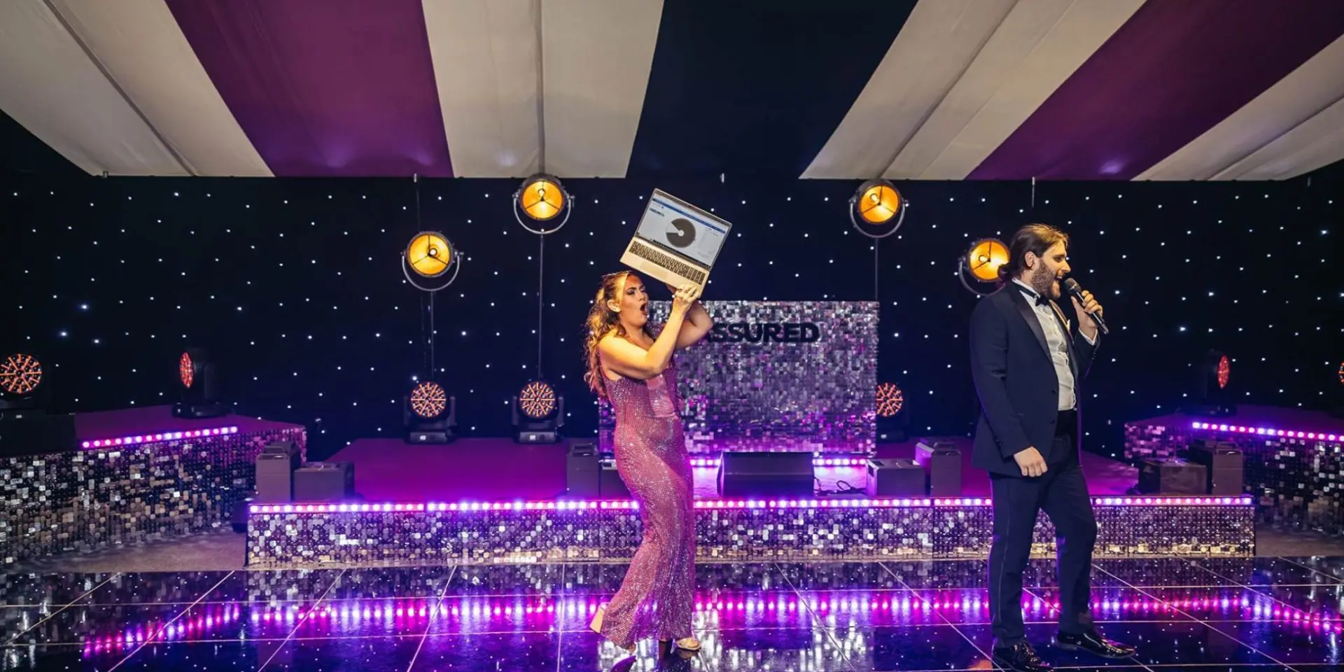 Corporate Supporters, Reassured's summer party event on a purple dance floor