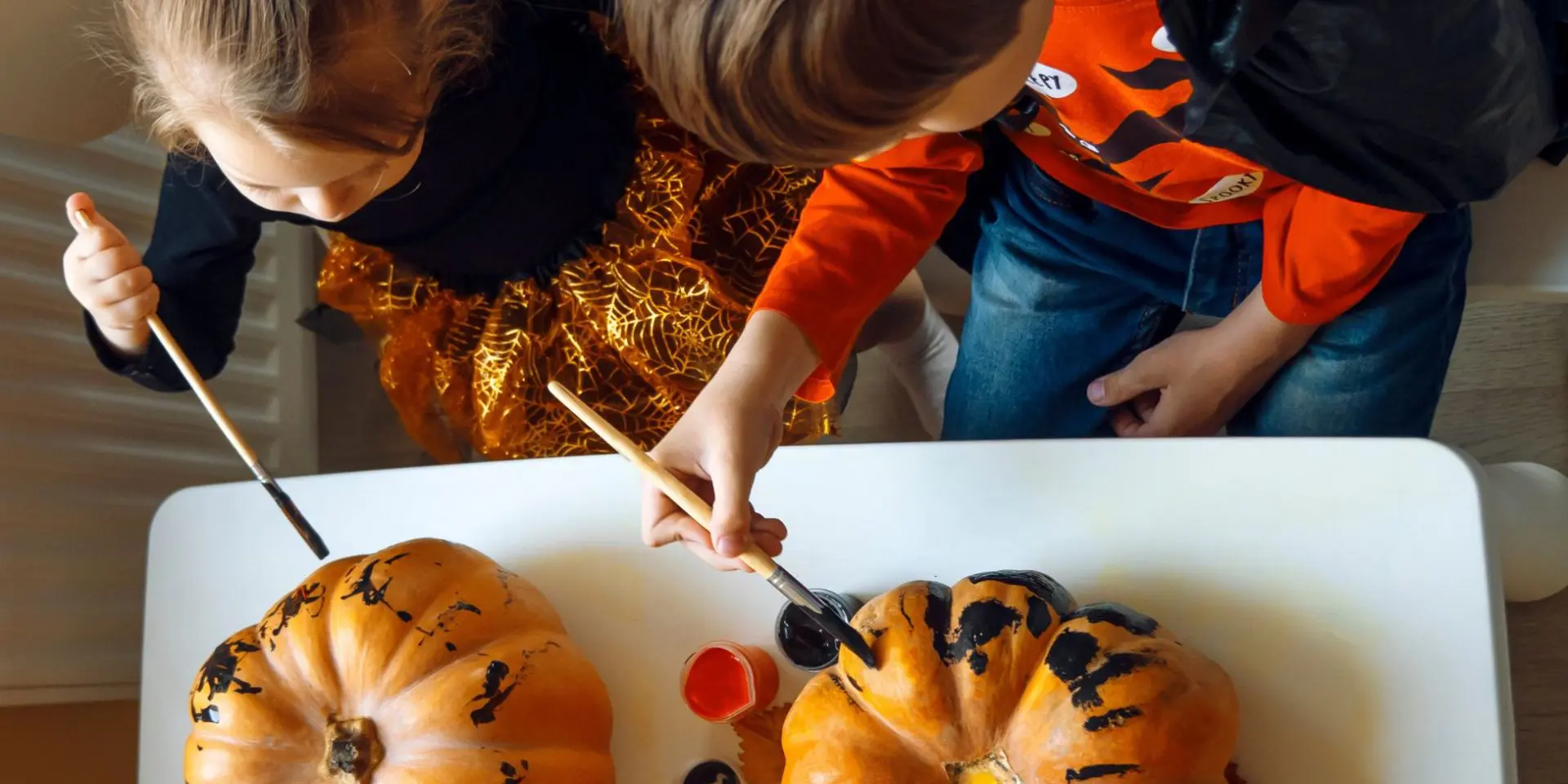 WAY Halloween post - children painting pumpkins