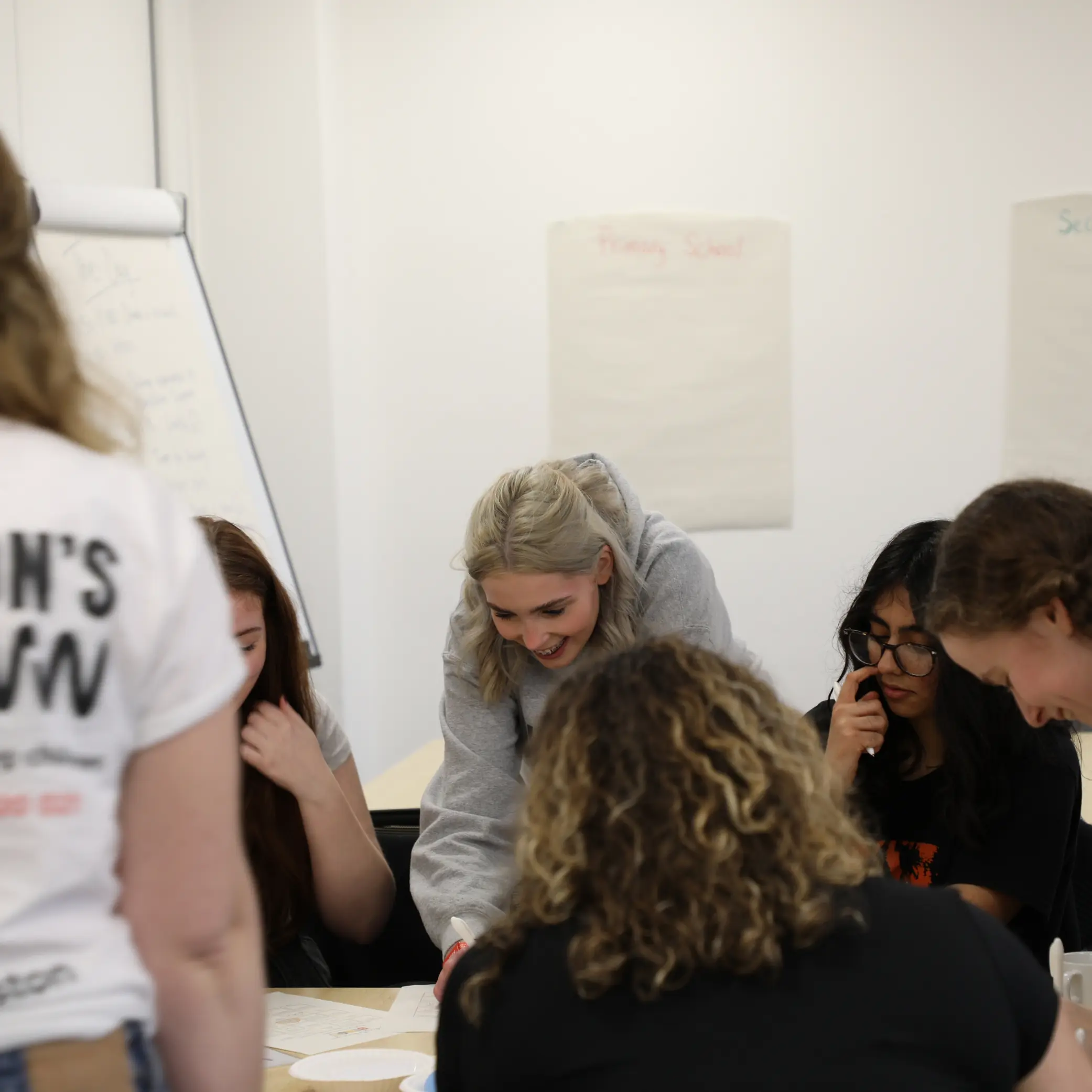 Youth Team gathered around a table, helping to shape the future of bereavement care for children and young people