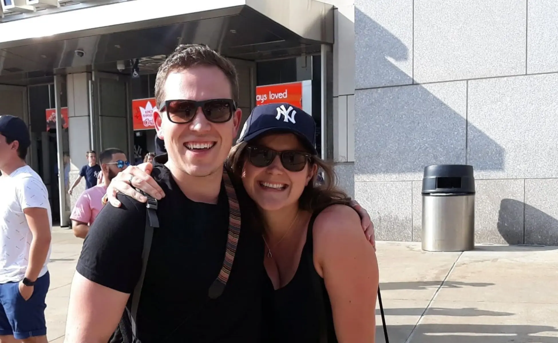Rachel and Nick smiling at the camera