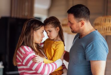 Explain-accidental-death Parents talking to child.