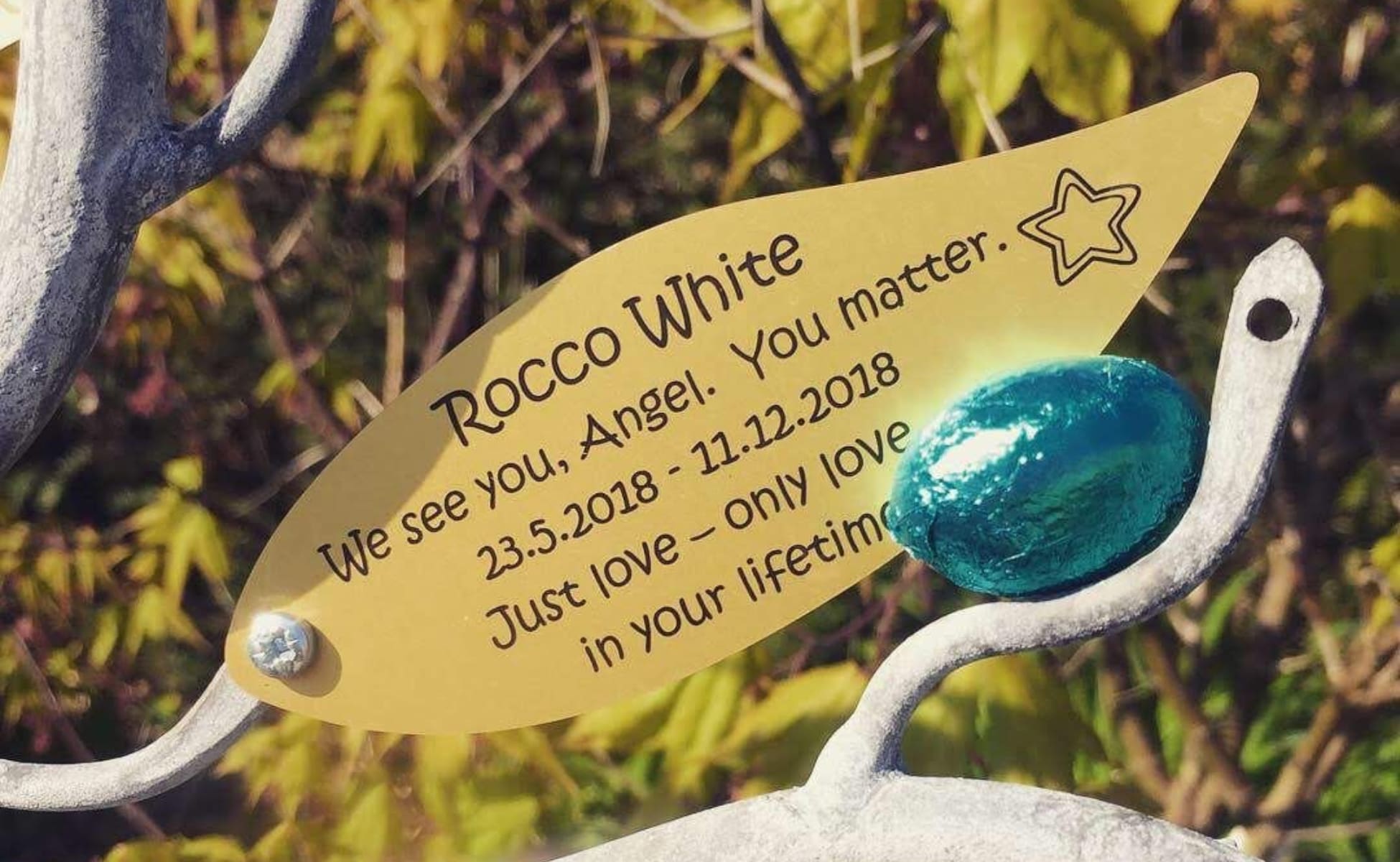 Rocco's memorial leaf, which reads: Rocco White. We see you, Angel. You matter. 23.5.2018 - 11.12.2018. Just love - only love in your lifetime.